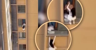 سيدة تتسلق ناطحة سحاب بملابس النوم هربًا من زوجة عشيقها.. نفدت بجلدها